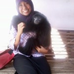 That is my picture with a gibbon = siamang. That picture was taken when I am in period second semester.